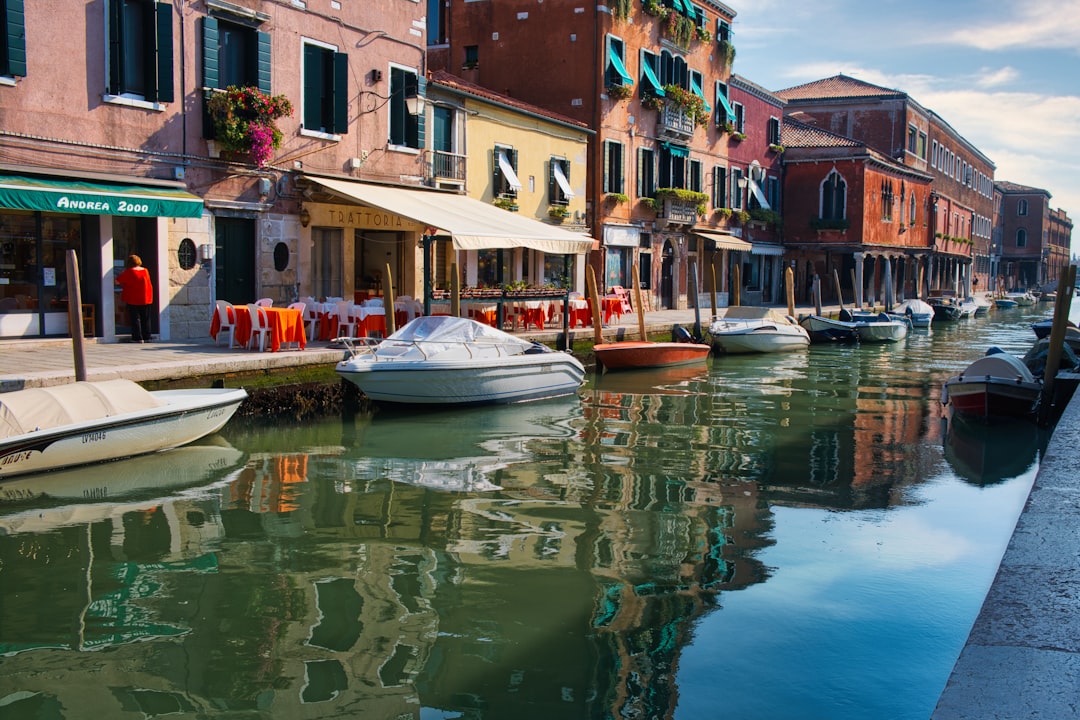 Old Town, Hull: Colorful buildings line a canal with boats in venice.